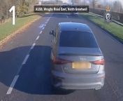 Lincolnshire Police have shared footage showing the moment an enraged driver nearly veered into the path of an oncoming lorry.&#60;br/&#62;&#60;br/&#62;The Audi driver went as far as sticking his head outside the car window to yell at the motorist behind him.&#60;br/&#62;&#60;br/&#62;His ill-considered actions nearly saw him struck by the passing HGV, narrowly avoiding a nasty crash.&#60;br/&#62;&#60;br/&#62;The clip was just one of a series shared on Twitter by police to highlight examples of dangerous driving.