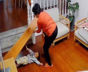 This is the heroic moment a grandmother&#39;s lightning-fast reflexes save a boy from being crushed by a heavy mirror as he looked at his reflection.